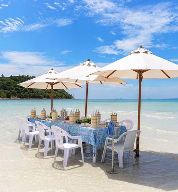 An afternoon tea set up on the beach of Koh Samui
