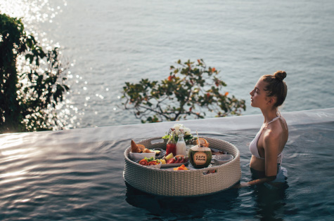 Served on a floating tray in the privacy of your pool or villa